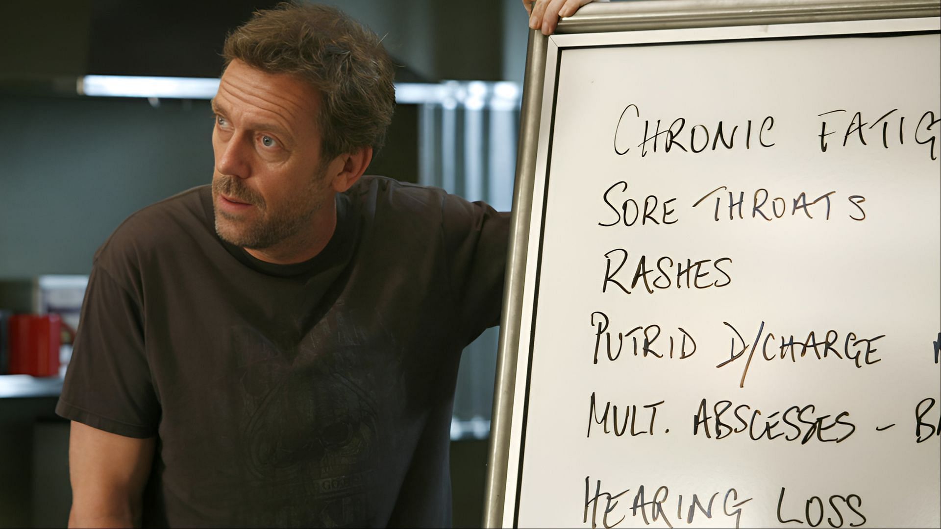 House breaks down medical symptoms on the whiteboard, but it’s the emotional diagnosis he avoids the most. (Image via Amazon Prime)